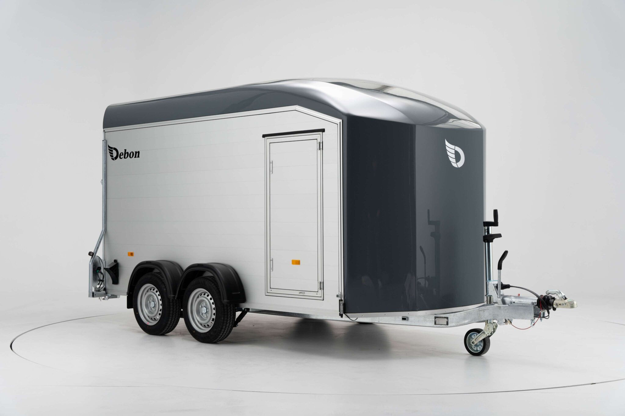 Debon enclosed box trailer with twin axle and side door studio image
