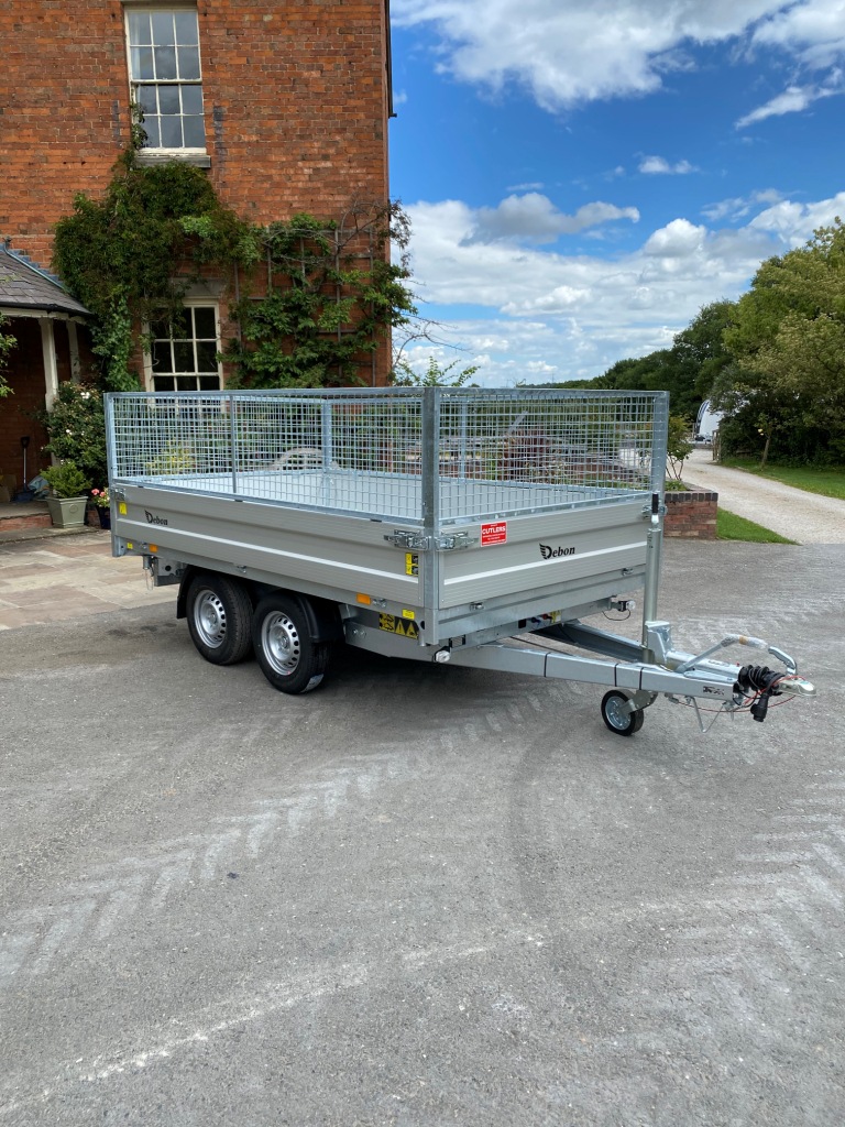 Debon PW2.4 3 way electric tipping trailer for sale with mesh sides and aluminium ramps UK