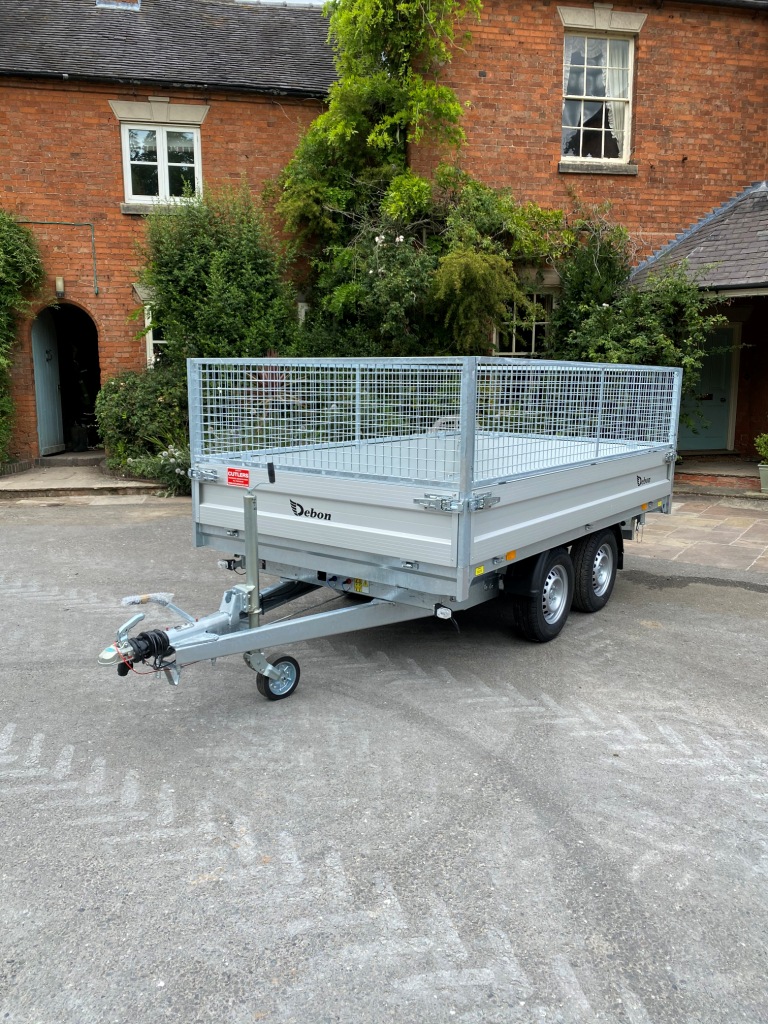 Side view of Debon PW2.4 twin axle 3 way tipping trailer with aluminium drop sides