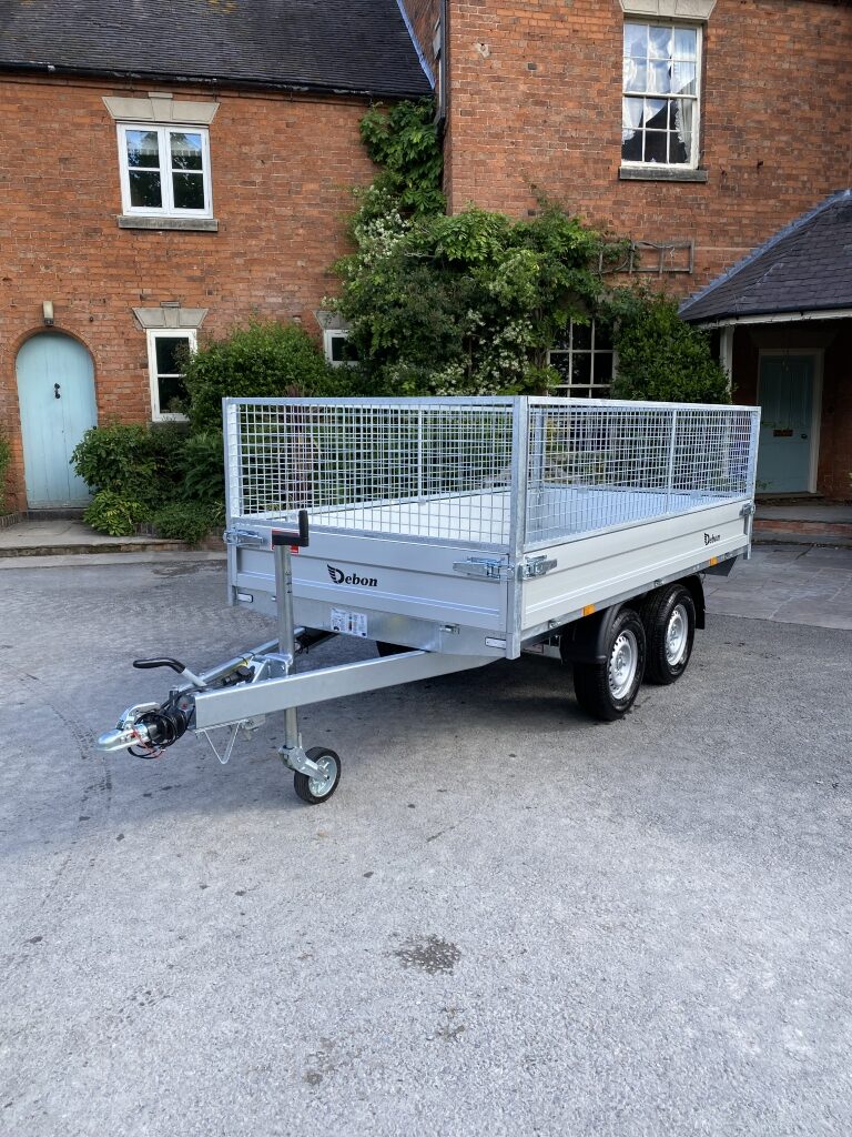 Side view of Debon PW1.2 twin axle tipper trailer with aluminium drop sides