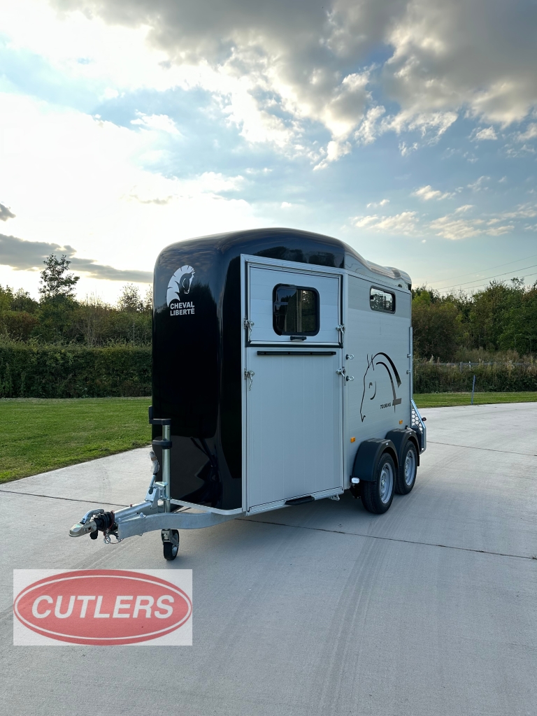 Touring Country horse trailer front angle view with aerodynamic nose and hitch