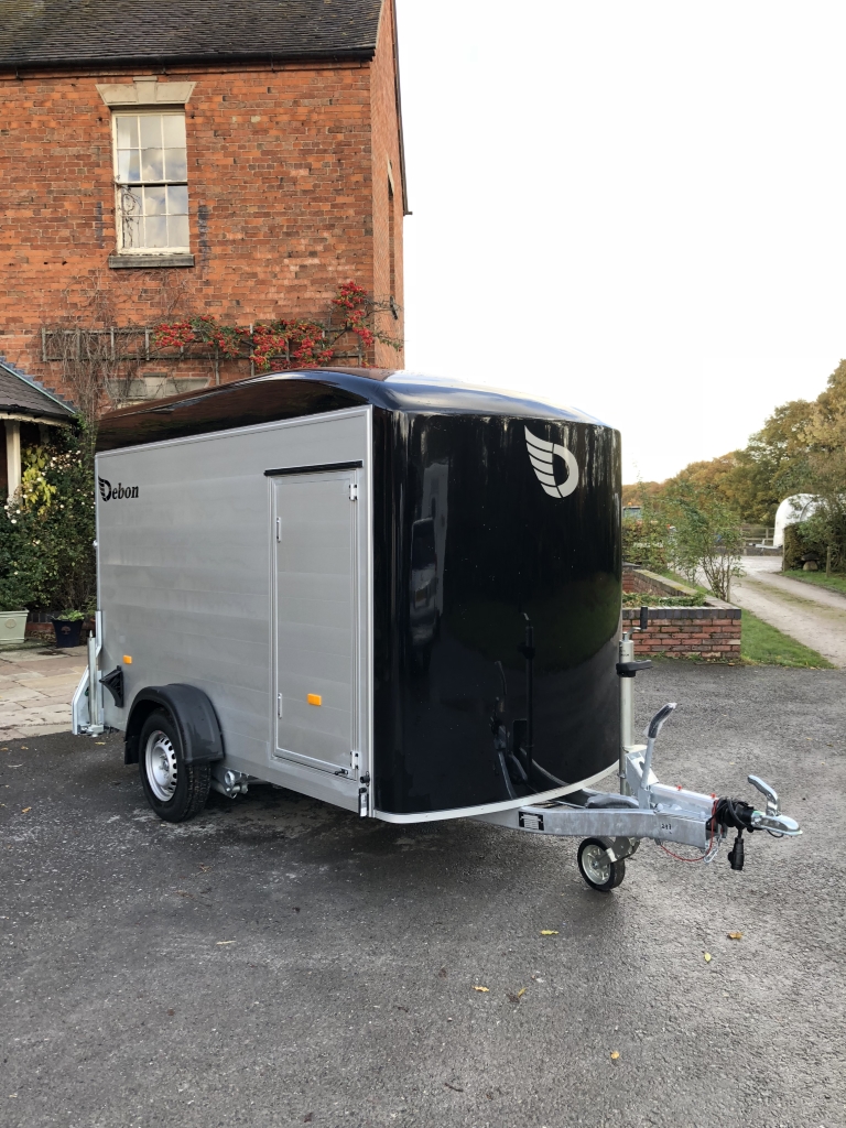 Debon C300 enclosed trailer angled front view on driveway