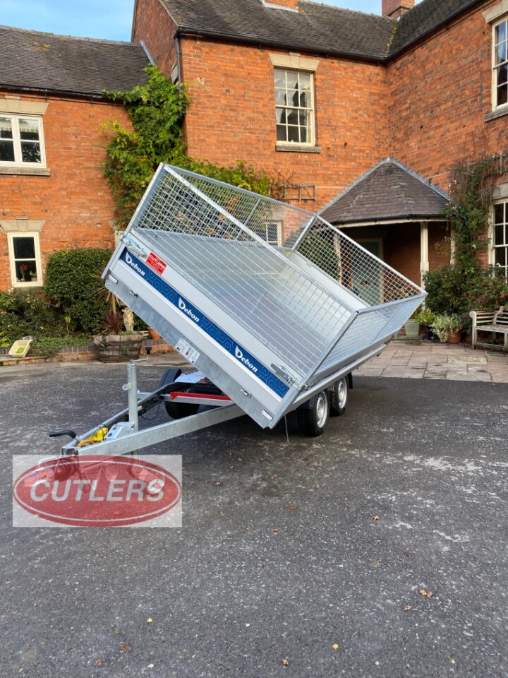 Debon box trailer parked outdoors with enclosed storage and twin axle
